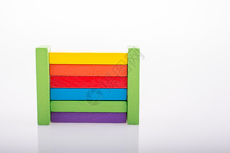 白色背景上的可调和的多米诺区块积木骨牌孩子们幼儿园商业教育玩具逻辑团体活动图片