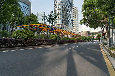 城市中心景观 现代商业背景反射地面建筑物晴天蓝色建筑学市中心交通街道玻璃背景图片