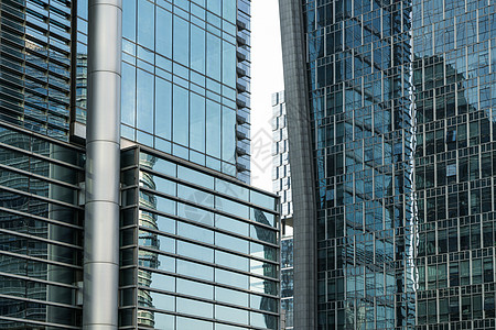 城市中心景观 现代商业背景金属市中心住宅建筑玻璃财产建造大街反射蓝色背景图片