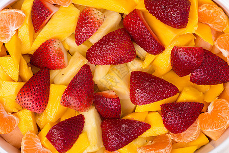 简单水果沙拉宏观黄色菠萝柑桔橘子绿色香味图片