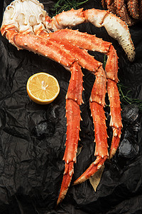 套新鲜的海鲜午餐派对章鱼螃蟹贝类动物甲壳小龙虾盘子柠檬图片
