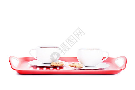 茶卡两杯茶和两杯饼干放在盘子上背景