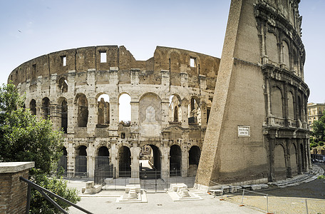 罗马的盛大旅行体育场建筑天空蓝色拱门斗兽场考古学石头废墟图片