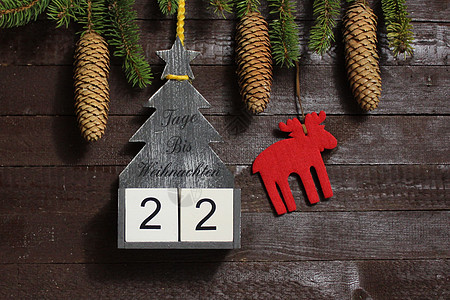圣诞节倒计时 文本天数直到圣诞节枝条时候贺卡木头日历杉枝数字装饰木板冬令图片