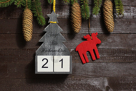 圣诞节倒计时 文本天数直到圣诞节倒数数字冬令枝条杉枝木板时候木头装饰贺卡图片