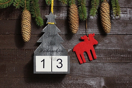 圣诞节倒计时 文本天数直到圣诞节装饰枝条冬令木板倒数数字木头杉枝日历贺卡图片