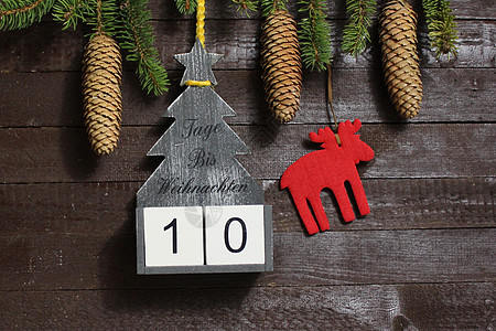圣诞节倒计时 文本天数直到圣诞节时候木板贺卡装饰数字冬令倒数枝条日历杉枝图片