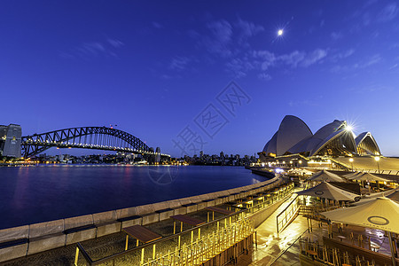 悉尼歌剧院和港口桥在夜里旅行建筑学地标房子天空城市港口天际建筑日落图片