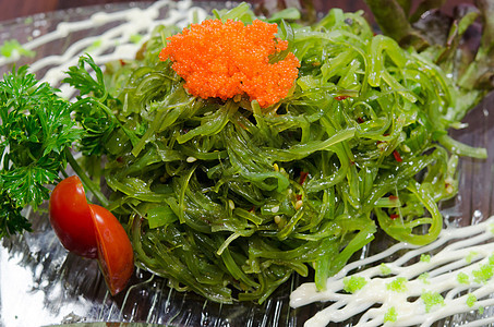 日本海藻沙拉盘子海鲜绿色沙拉芝麻胡椒食物种子红色饮食图片