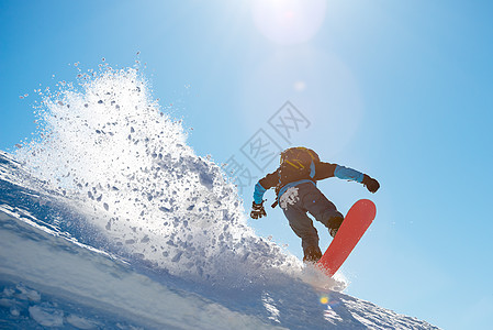 雪花大浪 滑雪和冬季体育比赛 在山上骑着红雪雪板的雪人图片