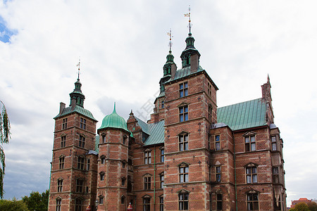 Rosenborg城堡 丹麦哥本哈根历史公园文化戏剧性天空插槽砖块城市花园旅游图片