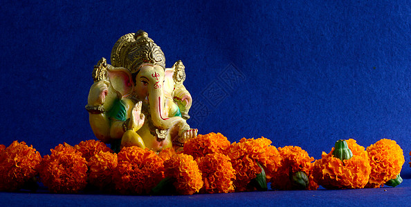 印度教上帝蓝色背景的偶像文化宗教精神数字雕塑雕像雕刻问候语信仰节日图片