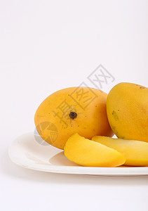篮子中芒果水果 白底切片产品小吃美食烹饪调味品食物热带维生素甜点国王图片