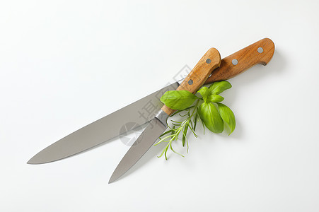 两把锋利的厨房刀炊具工具高架不锈钢全部厨师目的棕色用具图片