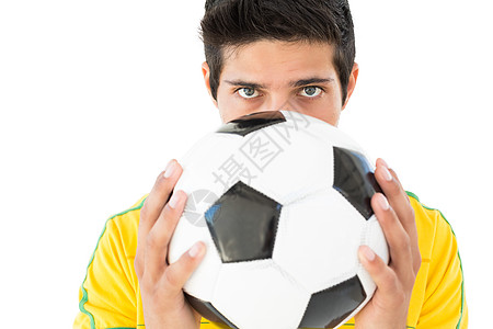 一位严肃足球运动员的近视肖像男人播放器黄色活动扇子运动观众支持者男性背景图片