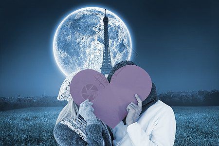 冬季情侣的复合形象 以心脏形状装扮成心形衣物月亮围巾男性男人女性阴影帽子夫妻绘图图片