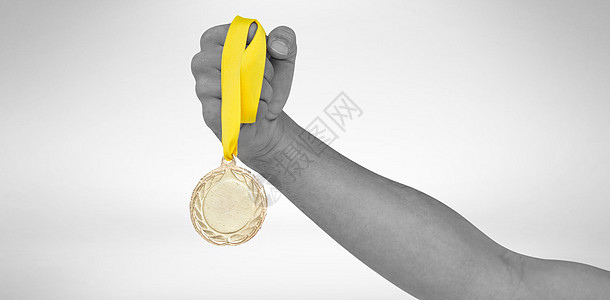 胜利后拥有金牌的运动员成就荣誉金子丝带游戏运动领导播放器奖章竞赛图片