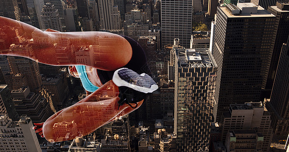 低角女运动员跳跃的复合图像摩天大楼身体跳远建筑阳光城市鸟瞰图运动运动服女性图片