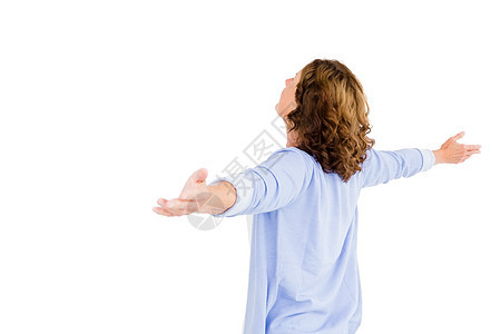 女人在祷告时伸出双臂向外伸展图片
