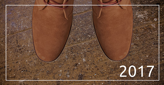 与Chukka棕色靴子相比 2017年新年愿望礼服地面潮人空白背景图片