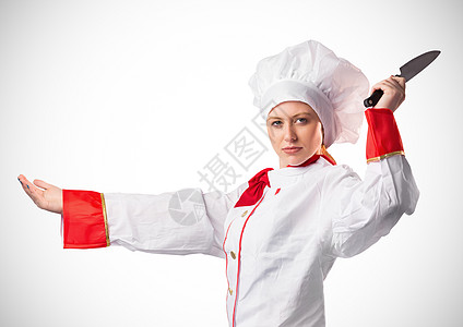 白色背景下用刀的厨师图片