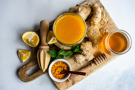含姜的有机食品概念药品理念医疗勺子砧板玻璃食物活力保健薄荷图片