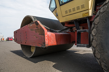 用于道路维修的沥青路面黄色红色重型振动滚筒压实机的详细信息 在新的道路施工现场工作 修复工程街道装载机赛跑者铺路活动柏油碎石振动图片