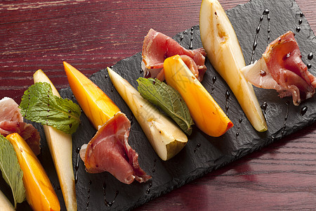 帕尔马火橙子猪肉柿子水果火腿火炉沙拉自助餐食物美食图片