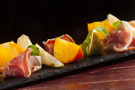 帕尔马火猪肉橙子水果自助餐火炉火腿沙拉熏制食物美食图片