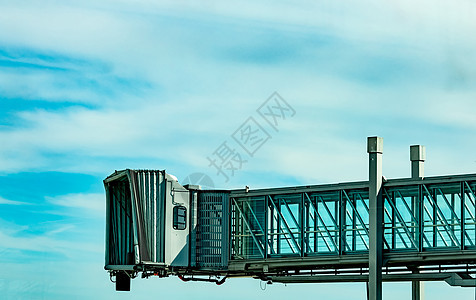 商业航空公司在阿盖机场起飞后架起喷气桥乘客空气技术天空假期旅游飞机坡道飞机场货运图片