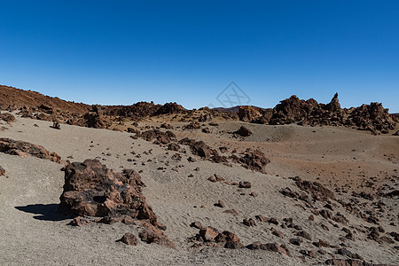 东坡的火星地貌碎片火山火山口旅游踪迹爬坡石头顶峰地质学天空图片