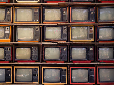 堆旧复古电视背景的图案墙音乐播送红色管子切换器棕色技术电影古董天线图片