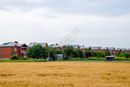 两层房屋的平原村 低层发展旅行通道土地住房产品小屋街道场地安装领土背景图片