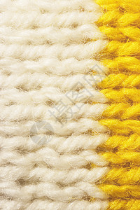 白色黄色羊毛针织质地 水平沿编织钩针详细行 毛衣纺织背景 微距特写图片