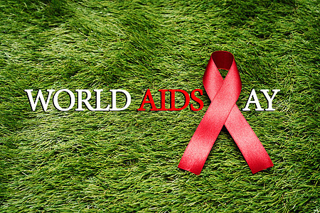 艾滋病意识标志红丝带 在 g 上与艾滋病作斗争疾病庆典安全免疫感染帮助预防团结乡村性别图片