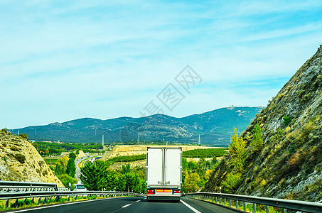 西班牙山峰的快路 美丽的穆恩风景天空全景车道公园蓝色运输金属荒野地平线国家图片
