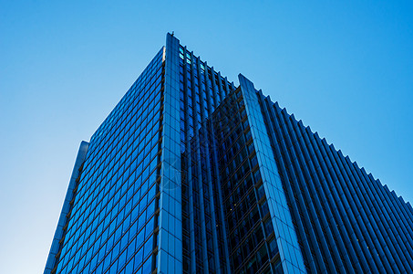 企业总部现代商业摩天大楼 高玻璃建筑 现代拱门库存蓝色高楼天空反射办公室公司总部工作太阳背景