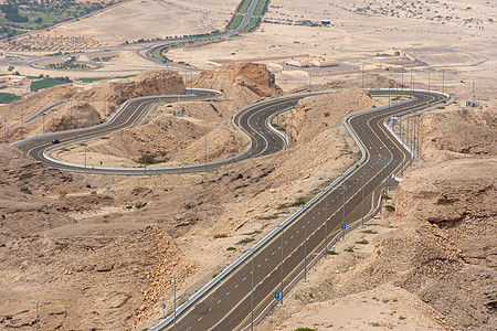 在杰贝勒哈费特上看到扭曲的高速公路 i地标旅行首脑岩石爬坡沙漠山脉旅游海湾酒店图片