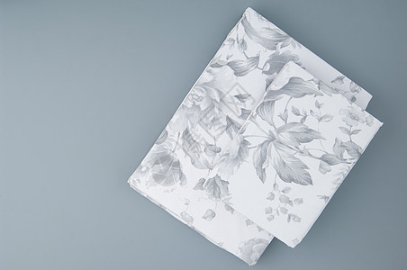 灰色背景上的床单用品材料织物洗衣店毯子白色纤维衣服纺织品卧室图片