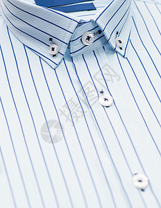 棉衬衣 缝合男性按钮条纹商业焦点折叠摄影蓝色服装织物图片