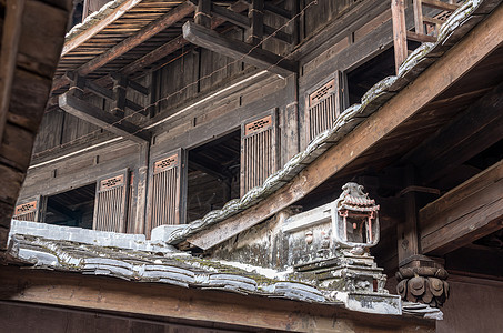 侗家土楼世界遗产地Tulou社区上层楼层建筑学窗户历史遗产土楼旅行村庄房子地面文化背景