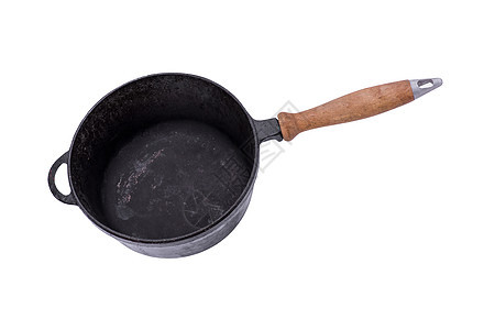 深黑的铁煎锅 用木制手柄投掷厨房黑色食物金属油炸烹饪厨具白色炊具图片