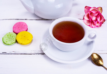 茶里装着白杯子的茶茶碗飞碟茶壶饮料早餐勺子食物酿酒师液体白色图片