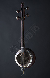 亚洲民族音乐乐器亚洲国家工艺音乐家唱歌督导员噪音细绳古董文化民间木质图片