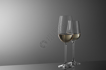 灯光背景的葡萄酒杯反射餐厅酒精白色灰色空白水晶玻璃酒杯液体图片