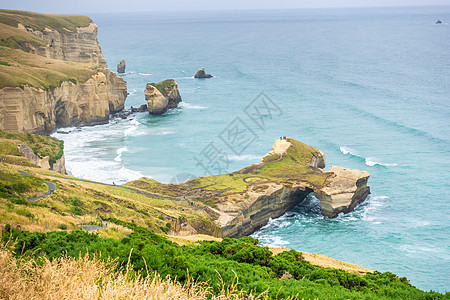 新西兰地道海滩海景全景悬崖旅游半岛海岸游客砂岩戏剧性地平线图片