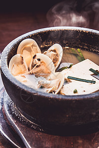 豆腐和贝壳 日本菜海鲜肉汤杯子餐厅蔬菜大豆食物美食图片