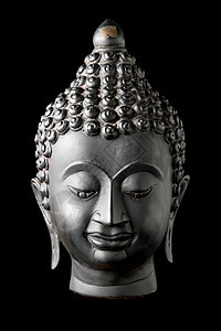 黑色背景的佛像石头祷告文化雕像精神宗教上帝艺术寺庙佛教徒图片