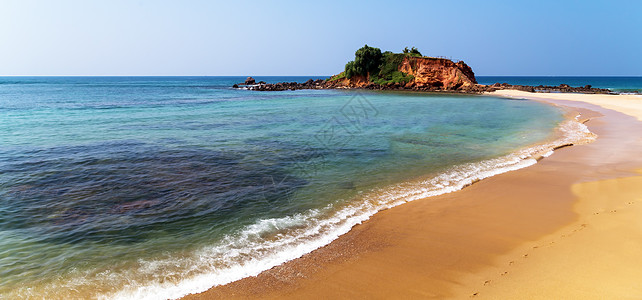 鹦鹉岩斯里兰卡 Mirissa椰子天空旅游旅行蓝色海滩阳光丛林热带岩石图片