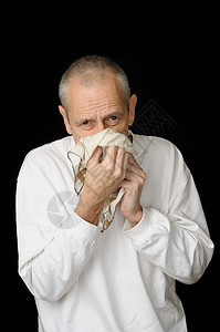 带着冷冷手帕的病人白色疼痛喷嚏保健组织过敏男人鼻子感染发烧图片